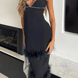 Abito a canotta con strati di pelliccia e strass