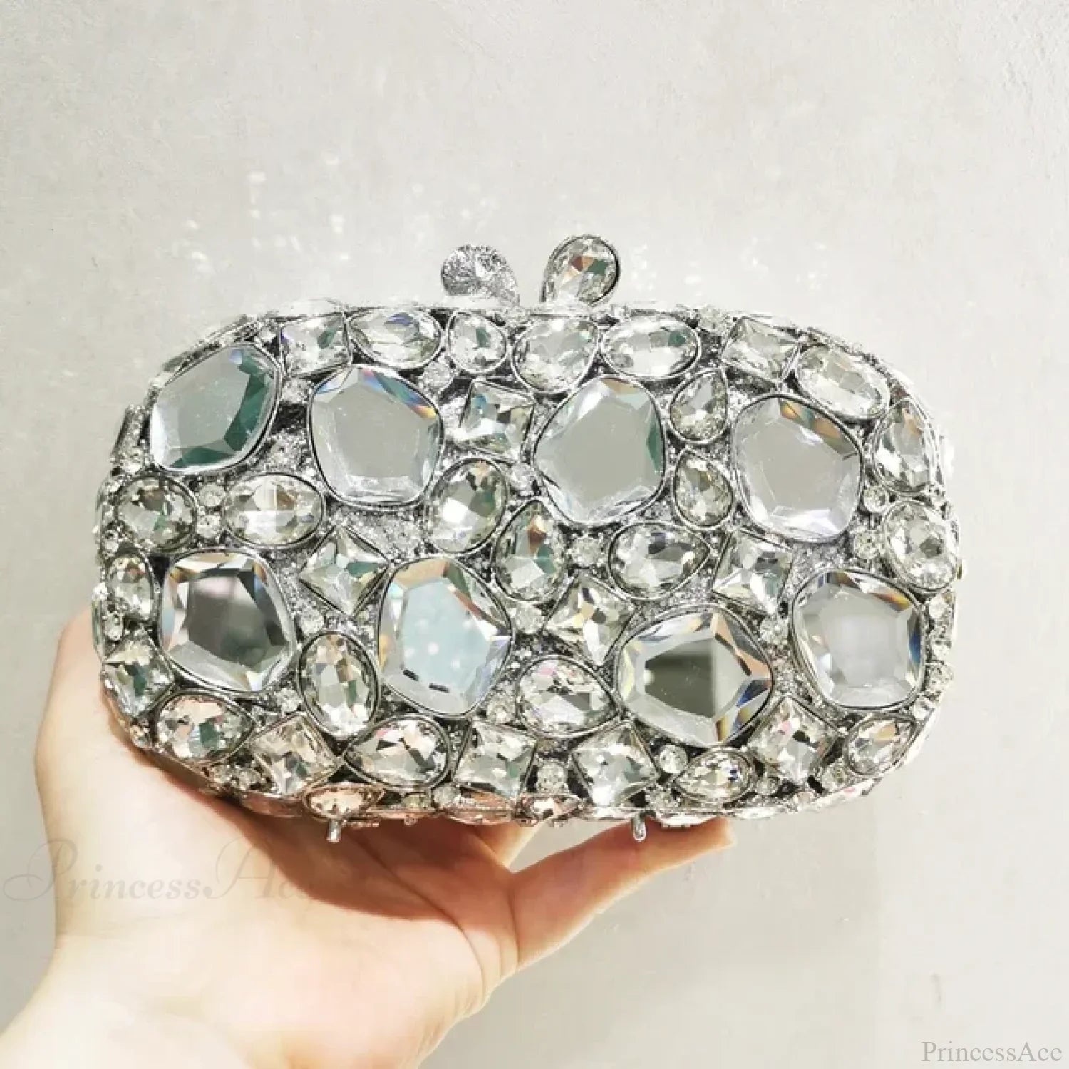 Pochette da sera con cristalli oro/argento