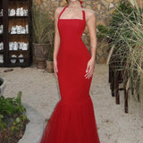 Abito lungo a coda di pesce con scollo all'americana e giunture