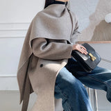 Cappotto in lana cashmere fatto a mano con cintura