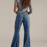 Jeans eleganti a vita alta e a zampa d'elefante lunghi fino al pavimento