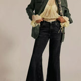 Jeans eleganti a vita alta e a zampa d'elefante lunghi fino al pavimento