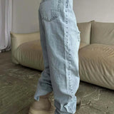 Jeans larghi a vita alta con gamba a falce