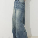 Jeans larghi a vita alta con gamba a falce