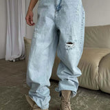 Jeans larghi a vita alta con gamba a falce