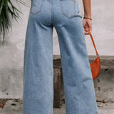 Jeans svasati a vita alta con tasche