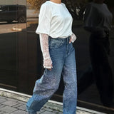 Jeans a gamba dritta con strass a vita alta
