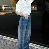 Jeans a gamba dritta con strass a vita alta