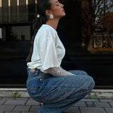 Jeans a gamba dritta con strass a vita alta