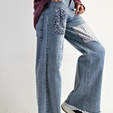 Jeans a gamba dritta con applicazioni a vita alta