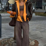 Jeans dritti marroni a vita alta