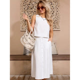 Completo da donna composto da due pezzi: top corto senza maniche, gonna midi in cotone con bottoni sul davanti