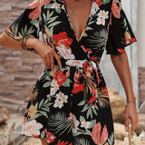 Tuta corta da donna – Scollo avvolgente – Maniche a balze – Cintura annodabile – Stampa floreale