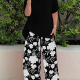 Pantaloni da donna a gamba larga – Vestibilità rilassata – Stampa floreale – Tessuto leggero e traspirante