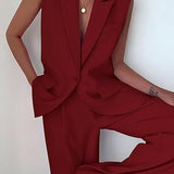 Abito da donna – Taglio aderente – Senza maniche – Ampi revers – Chiusura con bottoni