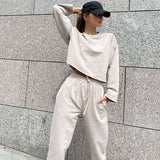 Completo sportivo da donna – Top corto a maniche lunghe – Pantaloni con elastico in vita