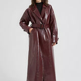 Trench da donna – Pelle sintetica lucida – Taglio con cintura – Lunghezza maxi