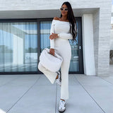 Tuta da donna – Vestibilità slim – Spalle scoperte – Maglia elasticizzata – Gamba svasata