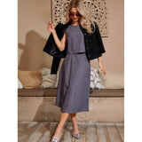 Completo da donna composto da due pezzi: top corto senza maniche, gonna midi in cotone con bottoni sul davanti