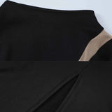 Abito a maniche lunghe con spacchi irregolari