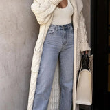 Soprabito in lana con doppio taschino e risvolto bianco lavorato a maglia