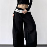 Jeans a gamba larga con vita alta e pannello in pizzo