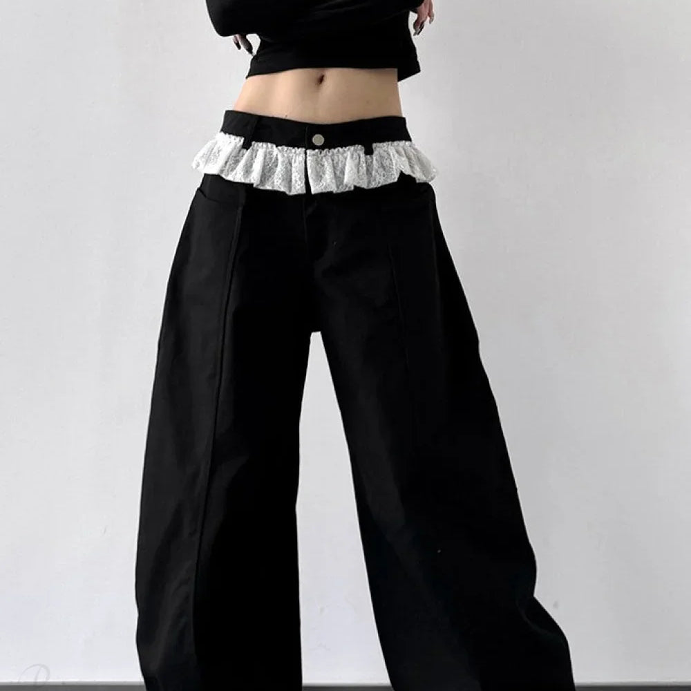 Jeans a gamba larga con vita alta e pannello in pizzo