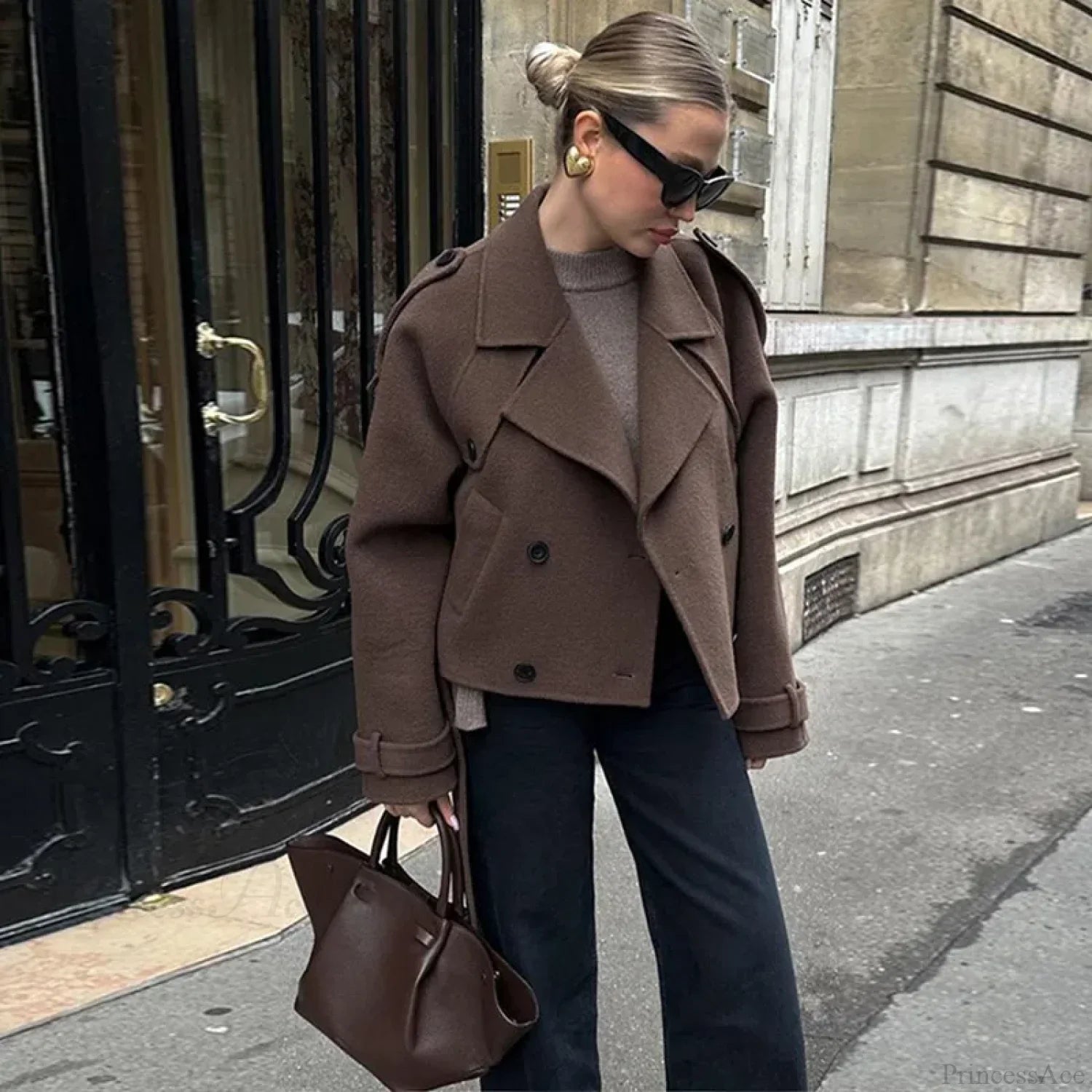 Cappotto in pelle patchwork di lana d'agnello con cintura