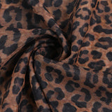 Abito lungo aderente con schiena scoperta e canotta leopardata