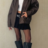 Cappotto in pelle con cerniera ampia e maniche lunghe