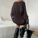 Cardigan largo con bottoni ricamati in maglia con bassotto