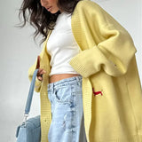 Cardigan largo con bottoni ricamati in maglia con bassotto