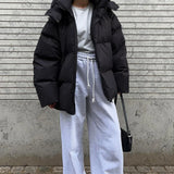 Cappotto in cotone con cappuccio minimalista e ampio