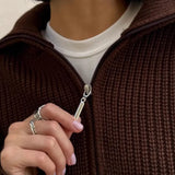 Cardigan ampio con cerniera e revers