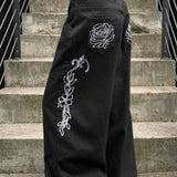 Jeans larghi a vita bassa con ricamo e gamba dritta