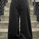 Jeans larghi a vita bassa con ricamo e gamba dritta