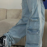 Jeans larghi a vita bassa e a righe