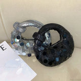 Mini pochette da sera a mezzaluna