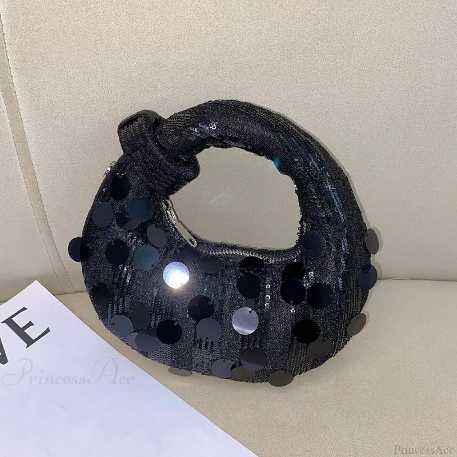 Mini pochette da sera a mezzaluna