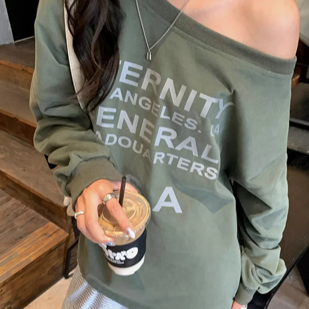 Felpa rilassata con stampa grafica e spalle scoperte