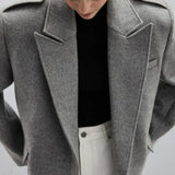 Cappotto largo in lana stile blazer con revers a lancia