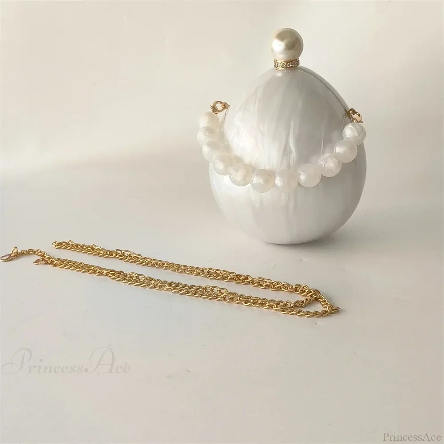 Borsa a tracolla ovale da sposa in acrilico color bianco perla