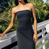 Abito lungo senza spalline con spalle scoperte e pois