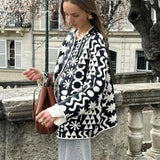 Cappotto monopetto in cotone stampato con scollo a V