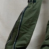 Pantaloni cargo svasati punk a vita bassa con cerniera e spacchi