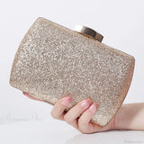 Pochette da sera con diamanti rossi