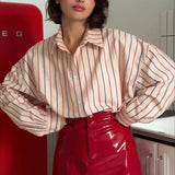 Gonna a tubino corta in similpelle rossa