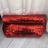 Pochette da polso in pelle con paillettes rosse