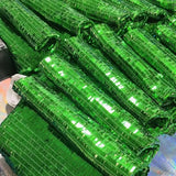 Pochette da polso in pelle con paillettes rosse