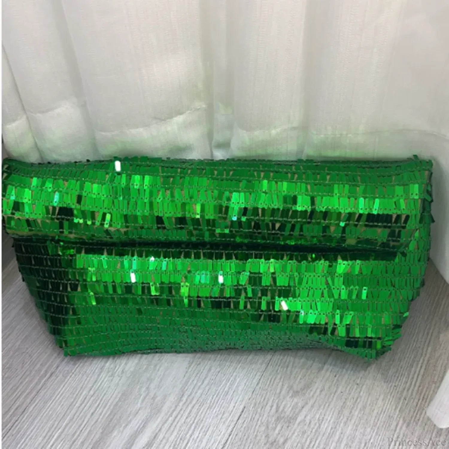 Pochette da polso in pelle con paillettes rosse